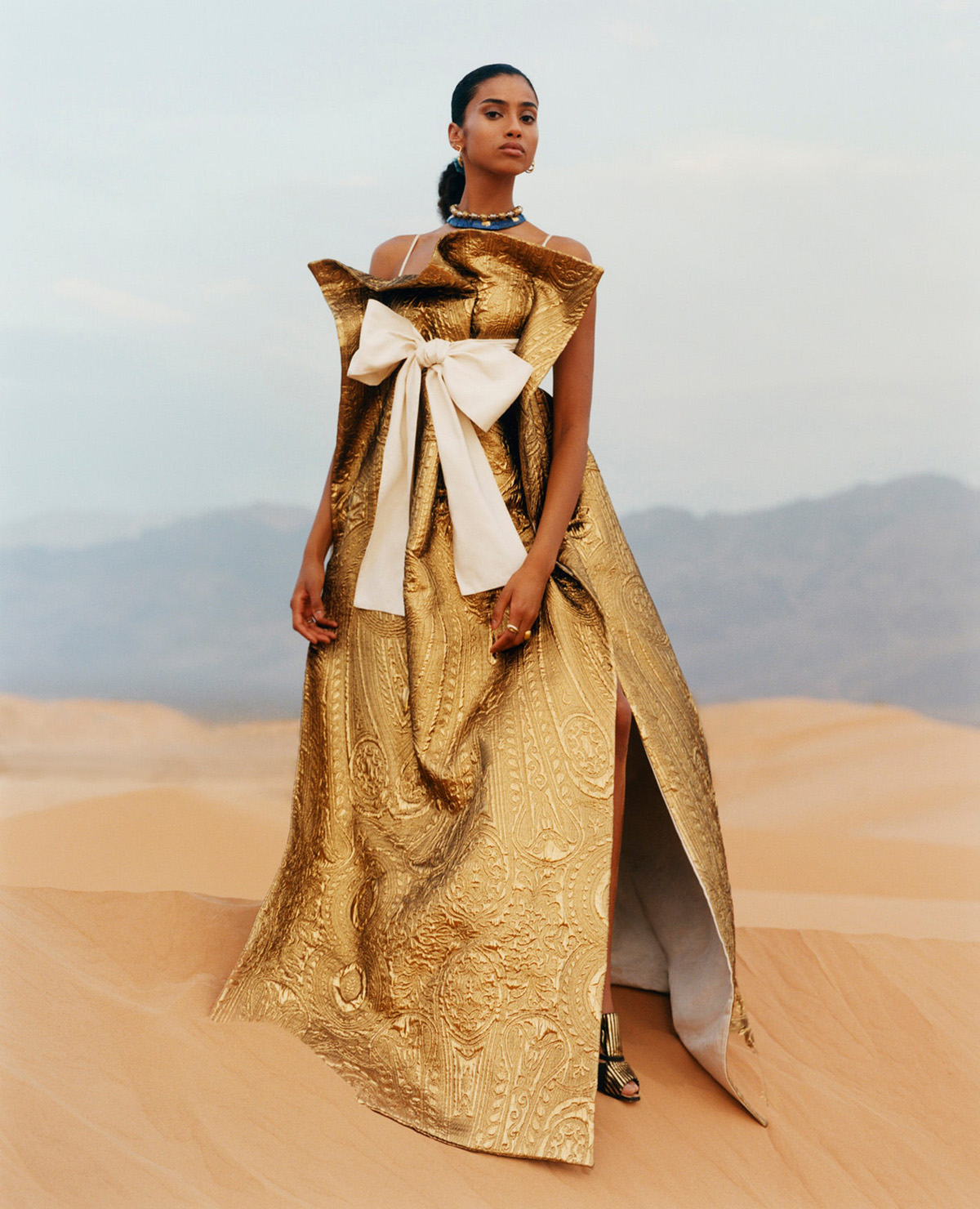 Imaan Hammam and He Cong by Eddie Wrey for Vogue Global January 2022