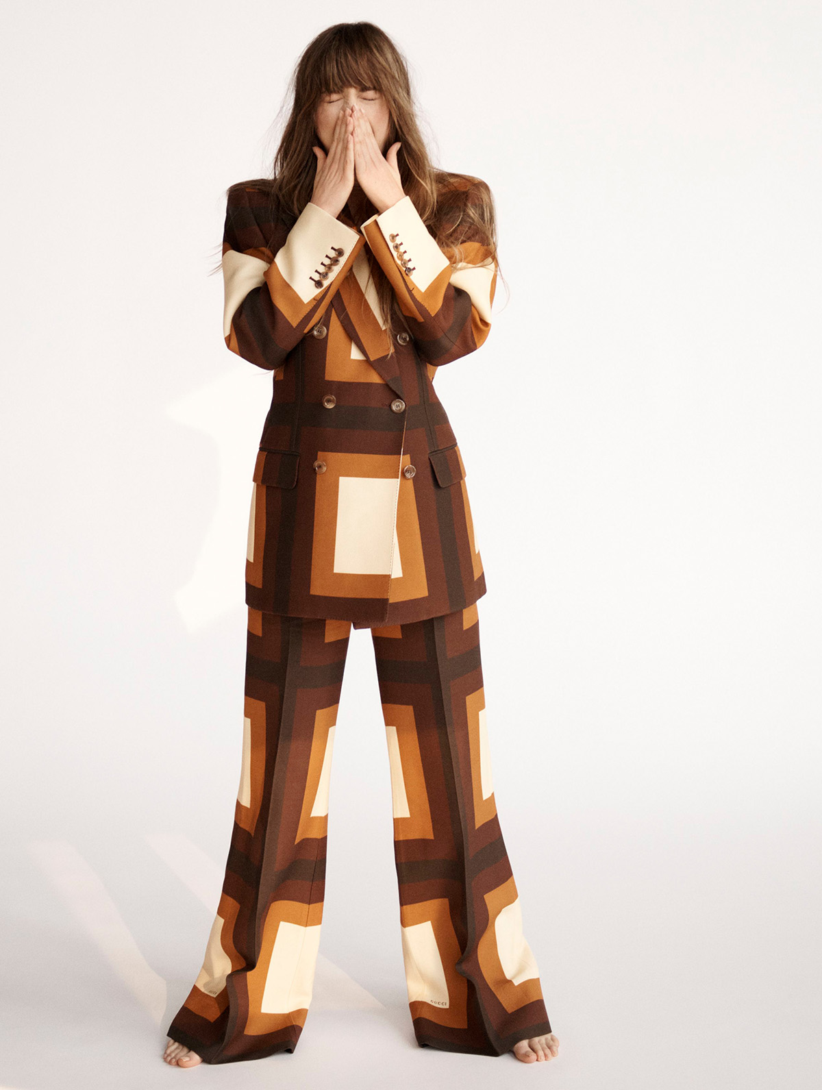 Dakota Johnson in Gucci on Elle UK February 2022 by Paola Kudacki