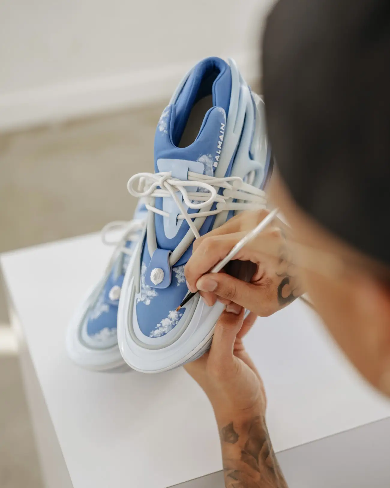 Balmain collaborates with artist Ant Kai for a fresh take on the Unicorn sneaker
